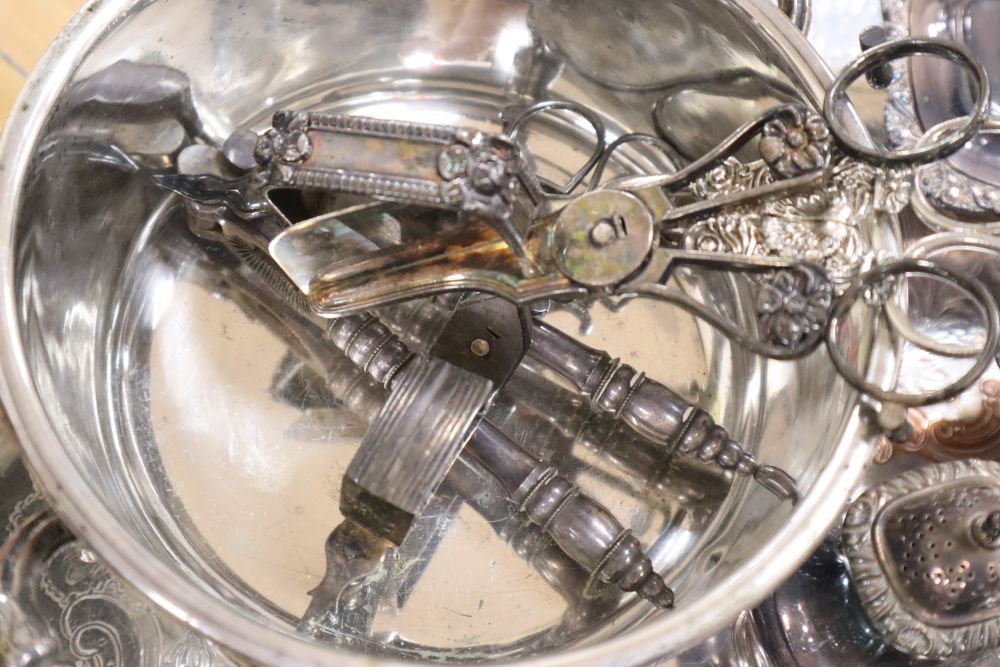 A large oval plated galleried tray and a collection of plated items,
